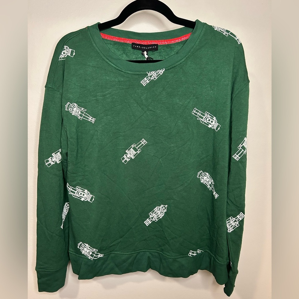 Jane and Delancey Green Sweatshirt with White Nutcracker Print